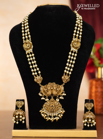 Pearl haaram peacock design with kemp & kundan stones and pearl & golden beads hangings