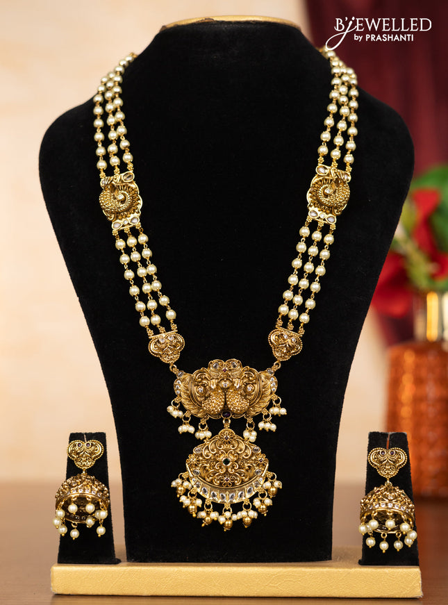 Pearl haaram peacock design with kemp & kundan stones and pearl & golden beads hangings