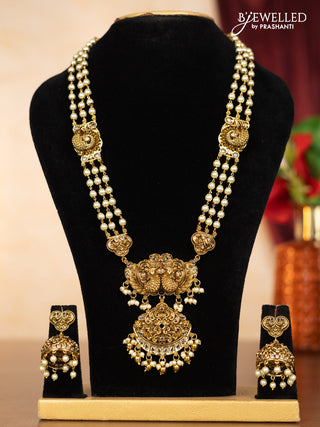 Pearl haaram peacock design with kemp & kundan stones and pearl & golden beads hangings