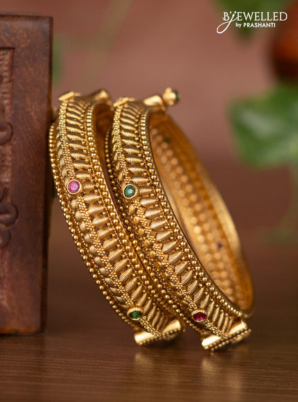 Antique screw type bangles with kemp stones