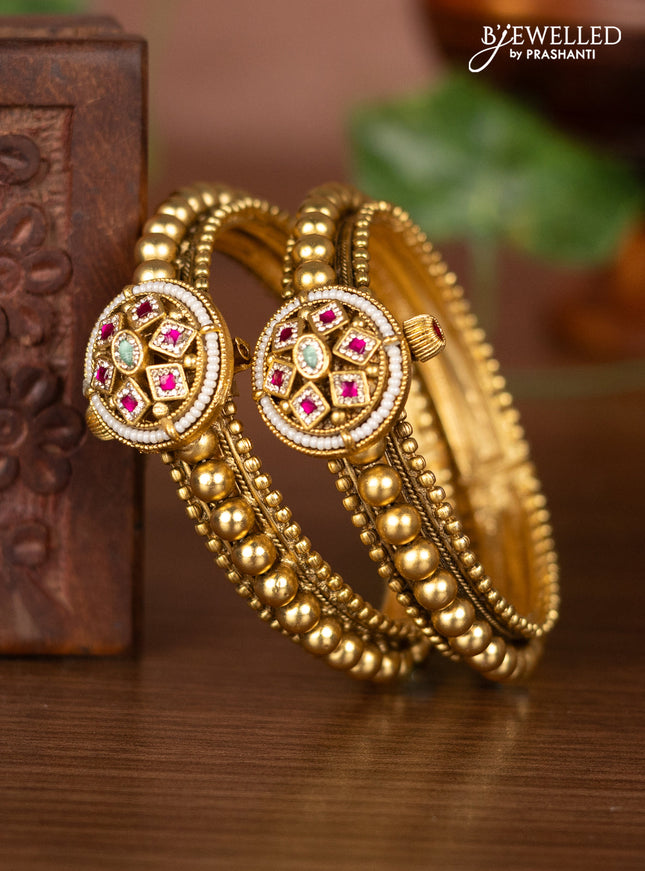 Antique screw type bangles with ruby & mint green and cz stones