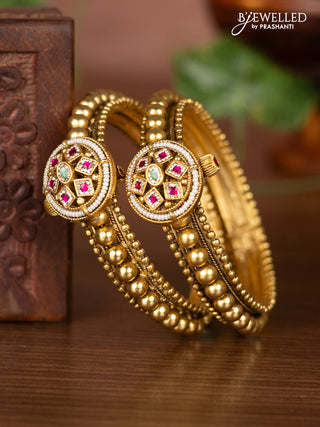 Antique screw type bangles with ruby & mint green and cz stones