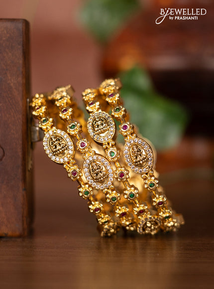 Antique bangles with lakshmi design and kemp & cz stones