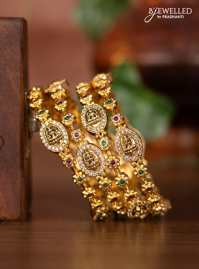 Antique bangles with lakshmi design and kemp & cz stones