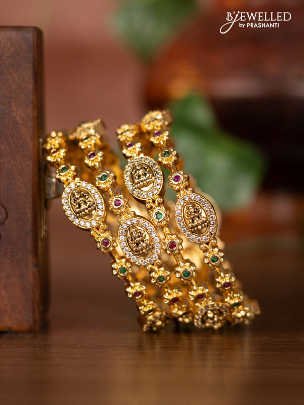 Antique bangles with lakshmi design and kemp & cz stones