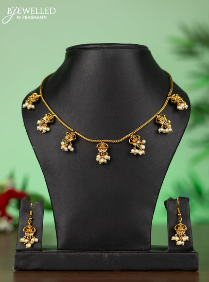 Attigai necklace with lakshmi pendant in kemp stones and pearl hanging