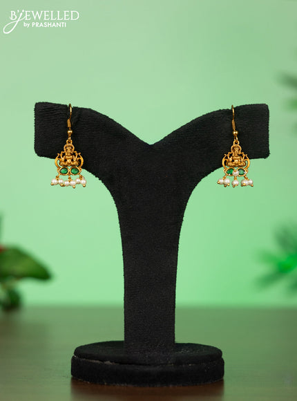Attigai necklace with lakshmi pendant in green stones and pearl hanging