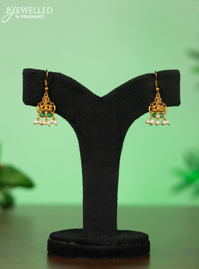 Attigai necklace with lakshmi pendant in green stones and pearl hanging