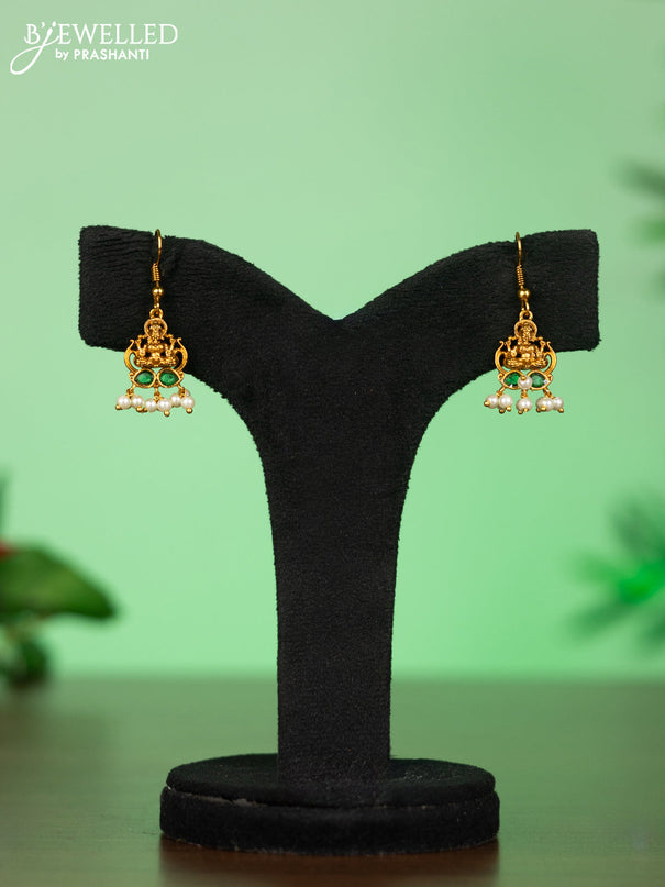 Attigai necklace with lakshmi pendant in green stones and pearl hanging