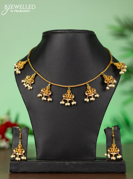 Attigai necklace with lakshmi pendant in kemp stones and pearl hanging