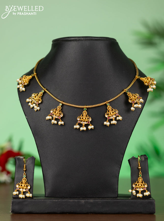 Attigai necklace with lakshmi pendant in kemp stones and pearl hanging