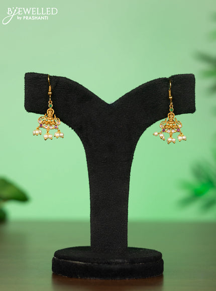 Attigai necklace with lakshmi pendant in kemp stones and pearl hanging