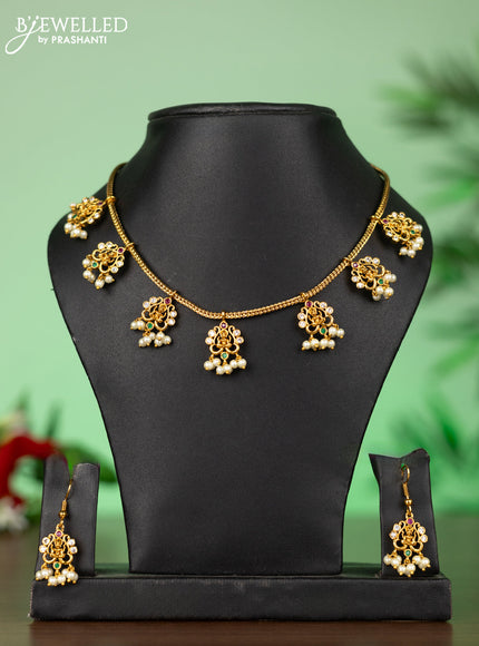 Attigai necklace with lakshmi pendant in kemp stones and pearl hanging