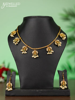 Attigai necklace with lakshmi pendant in kemp stones and pearl hanging
