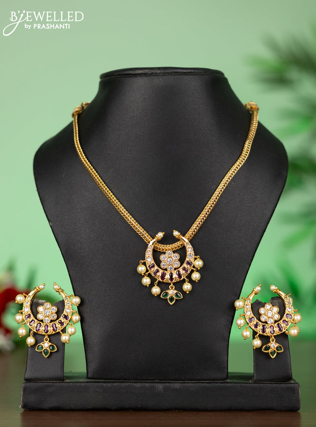 Attigai necklace with chandbali pendant in kemp,green stones and pearl hangings
