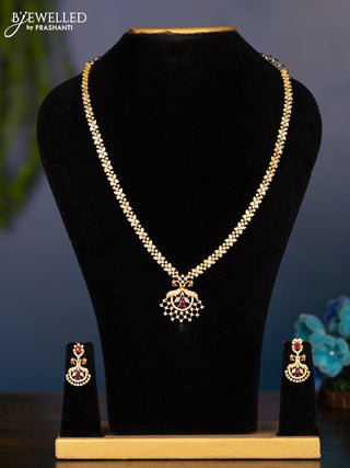 Zircon haaram with ruby and cz stones in gold finish