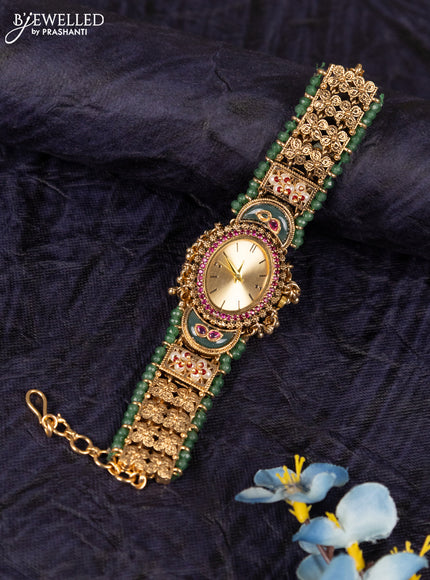 Antique watches yellow dial floral design oval shape with kemp stones and green beads