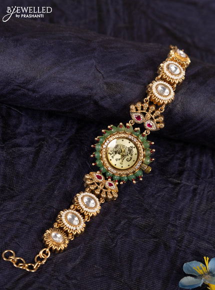 Antique watches with yellow elephant dial and jadau kundan stone and green beads