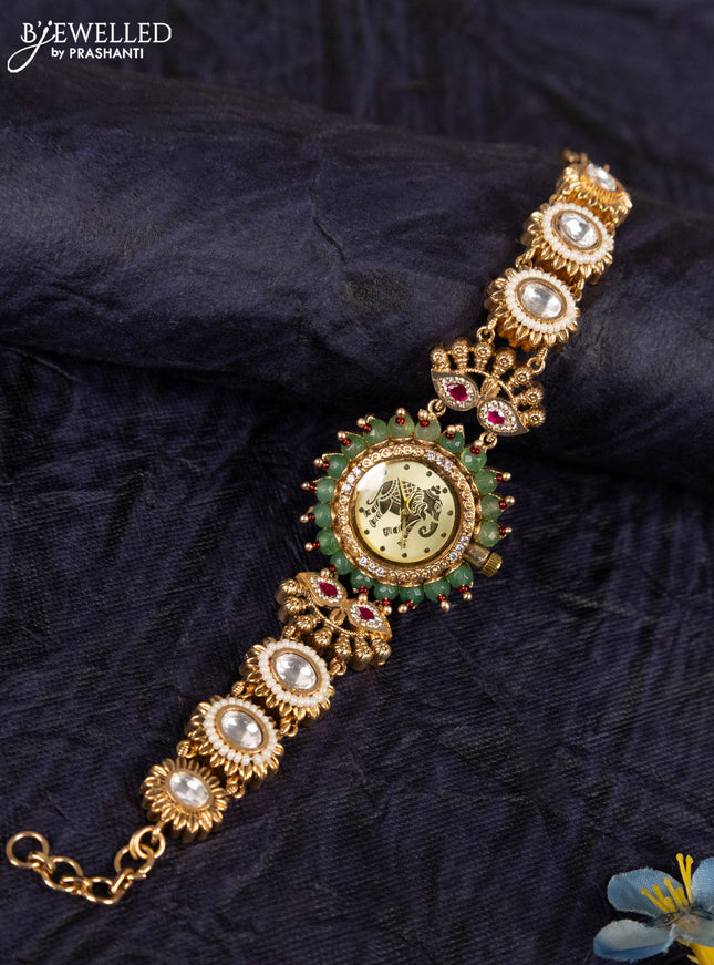 Antique watches with yellow elephant dial and jadau kundan stone and green beads