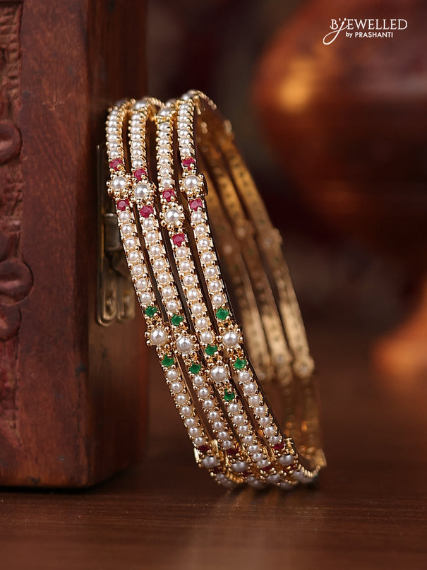 Pearl bangle with kemp stones and pearls in gold finish