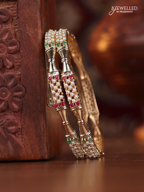 Pearl bangle with kemp stones and pearls in gold finish