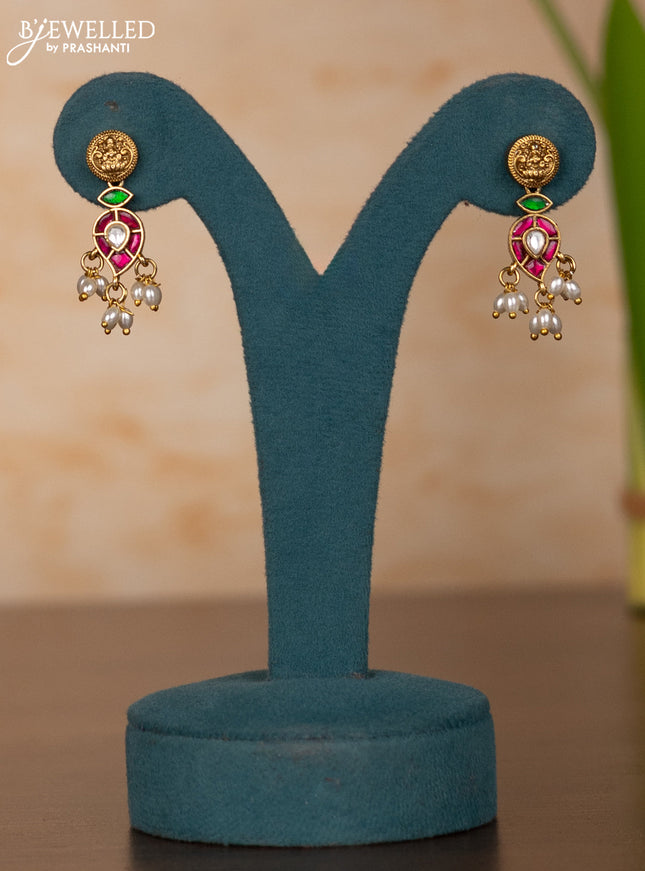 Jadau Haaram with lakshmi kaasu design in jadau kundan stones and rice pearl hanging