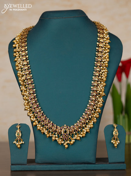 Antique guttapusalu haaram floral design in kemp stones and pearl hanging