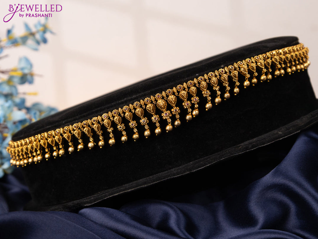 Antique hip chain floral design with pink kemp stones and golden beads hangings