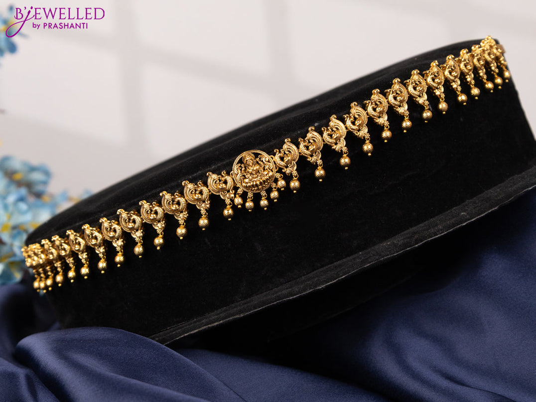 Antique hip chain with lakshmi & peacock design and golden beads hangings