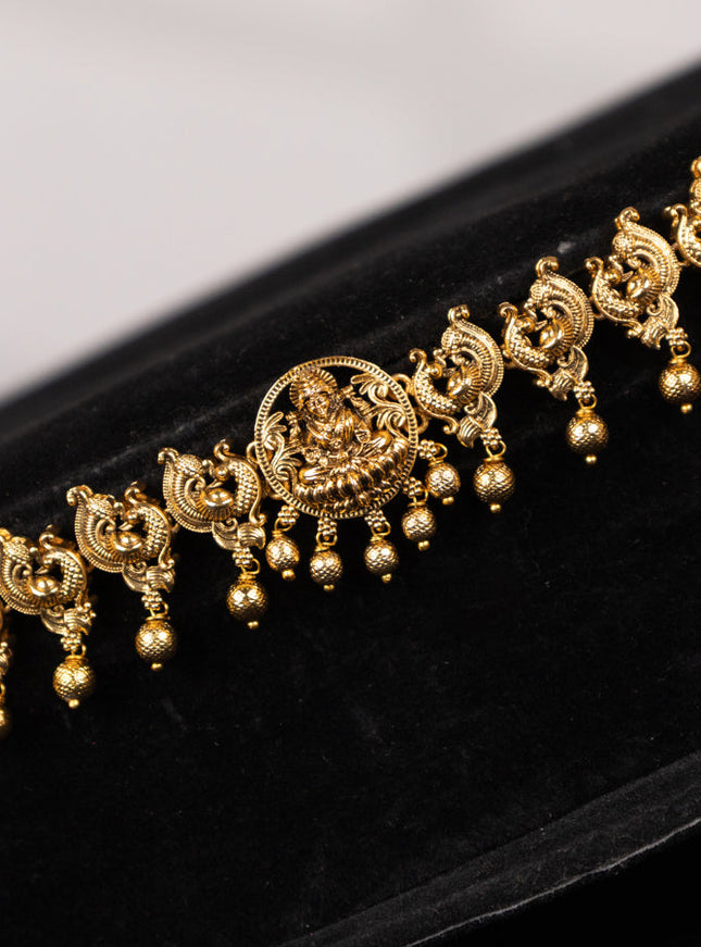 Antique hip chain with lakshmi & peacock design and golden beads hangings