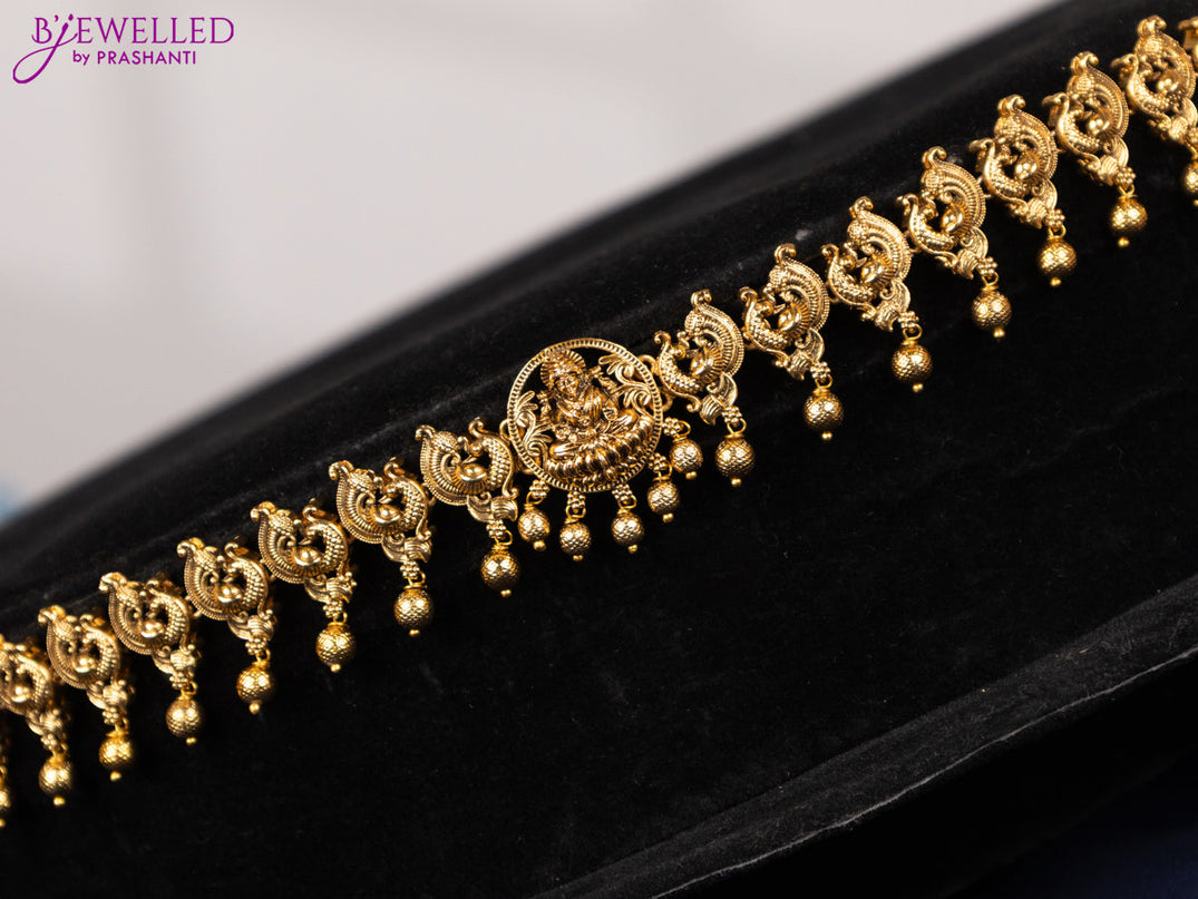 Antique hip chain with lakshmi & peacock design and golden beads hangings