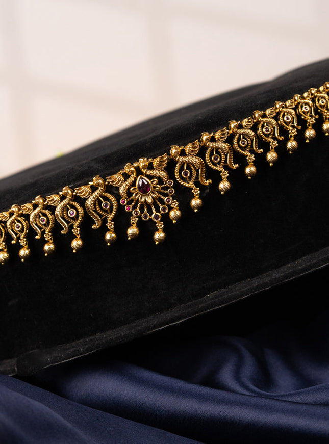 Antique hip chain peacock design with pink kemp stones and golden beads hangings