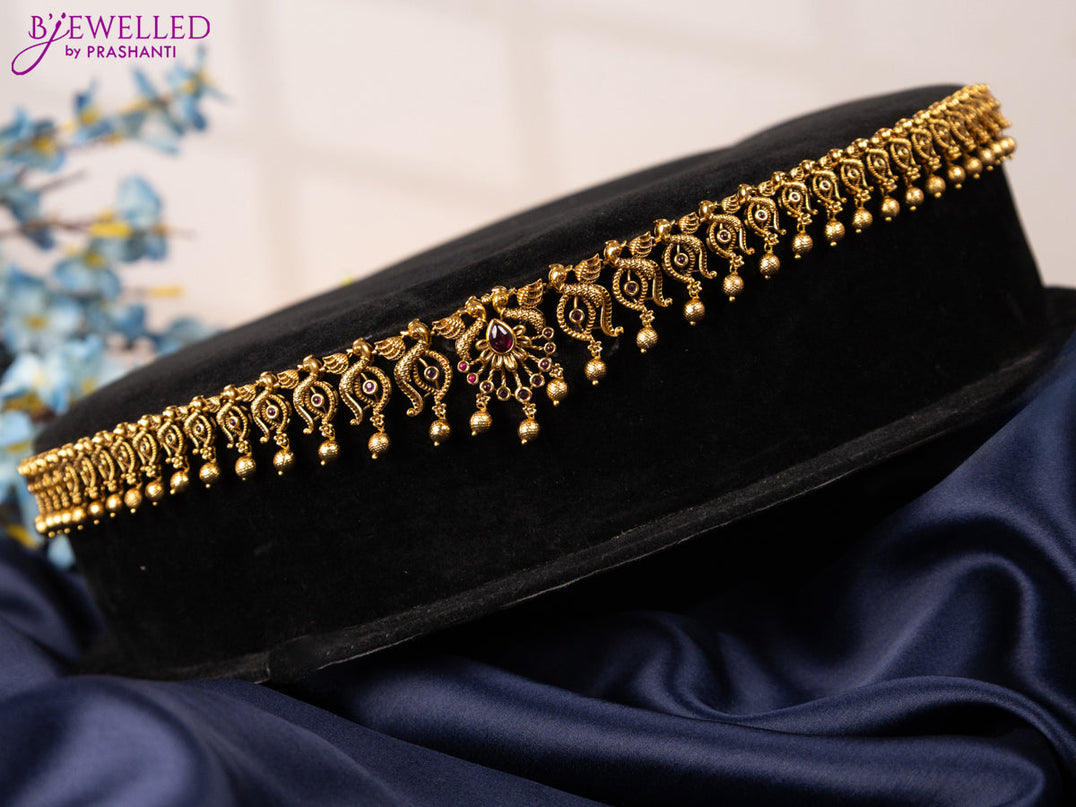 Antique hip chain peacock design with pink kemp stones and golden beads hangings