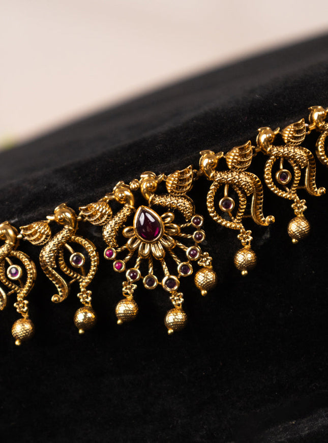 Antique hip chain peacock design with pink kemp stones and golden beads hangings