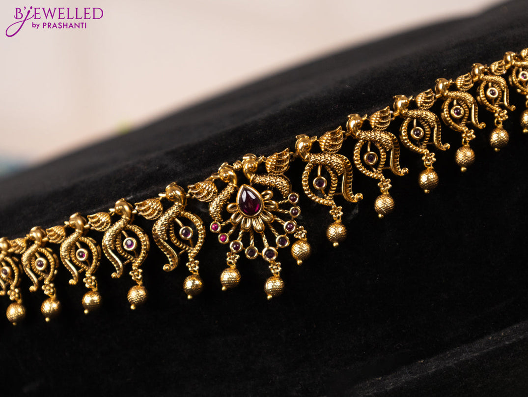 Antique hip chain peacock design with pink kemp stones and golden beads hangings