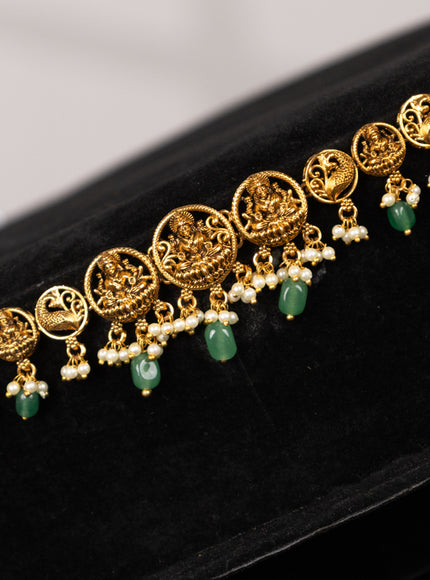 Antique hip chain with lakshmi design and pearl & mint green beads hangings