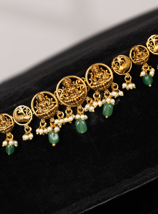 Antique hip chain with lakshmi design and pearl & mint green beads hangings