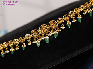 Antique hip chain with lakshmi design and pearl & mint green beads hangings
