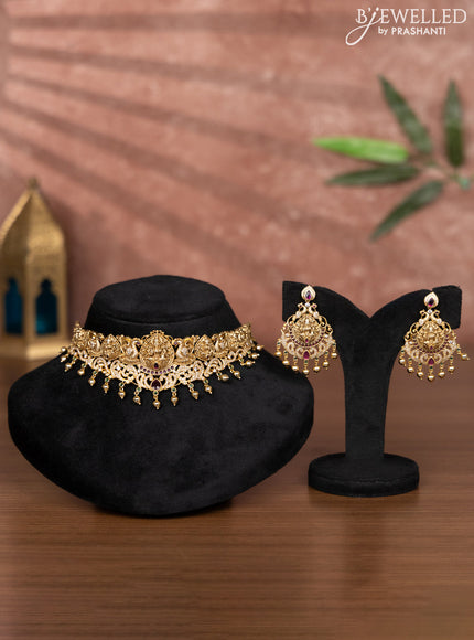 Antique choker lakshmi design with emerald & cz stones and golden beads hangings