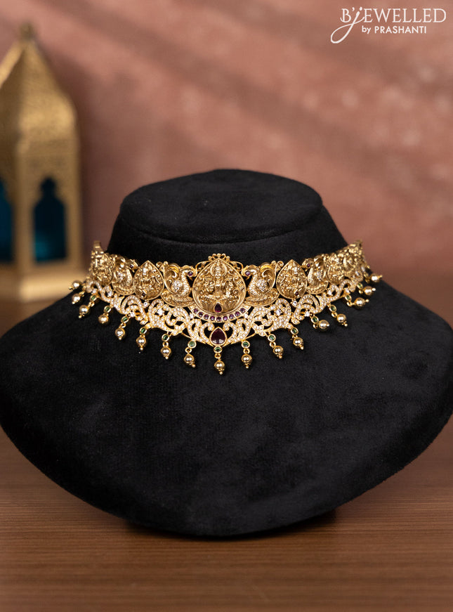 Antique choker lakshmi design with emerald & cz stones and golden beads hangings