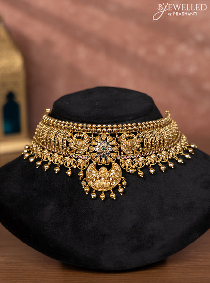 Antique choker lakshmi design with kemp & cz stones and golden beads hangings