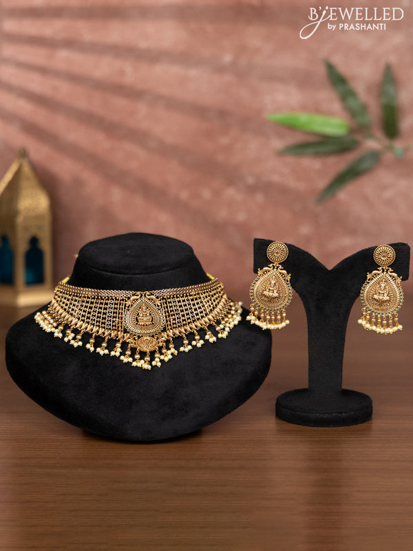 Antique choker lakshmi design with kemp stones and pearl hangings
