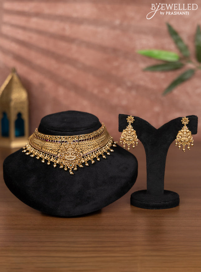 Antique choker lakshmi design with kemp stones and golden beads hangings