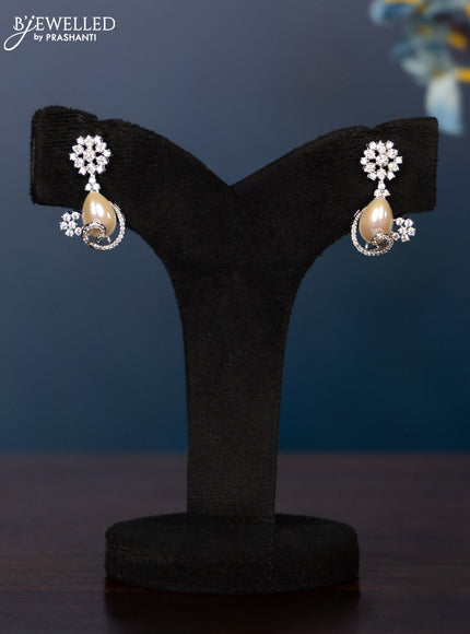 Zircon necklace with tear drop shape pearl embedded and covered in cz stones