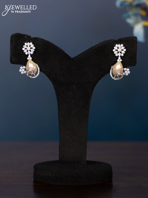 Zircon necklace with tear drop shape pearl embedded and covered in cz stones