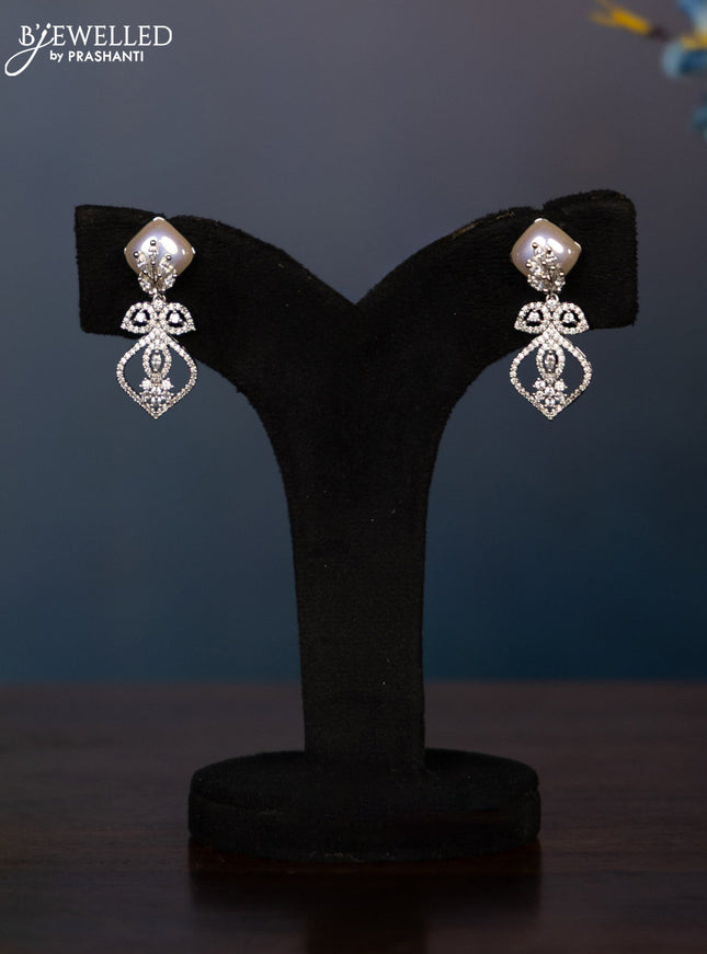 Zircon necklace with tear drop shape pearl embedded and covered in leaf shape cz stones