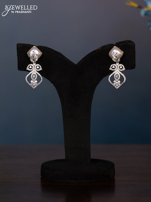 Zircon necklace with tear drop shape pearl embedded and covered in leaf shape cz stones