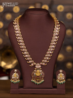 Antique haaram with lakshmi pendant in multicolor kemp and green beads hanging