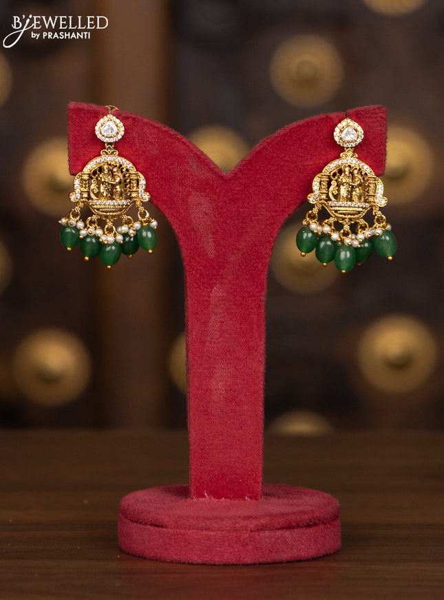 Antique haaram with 3D ram parivaar pendant in white stones and green beads hanging