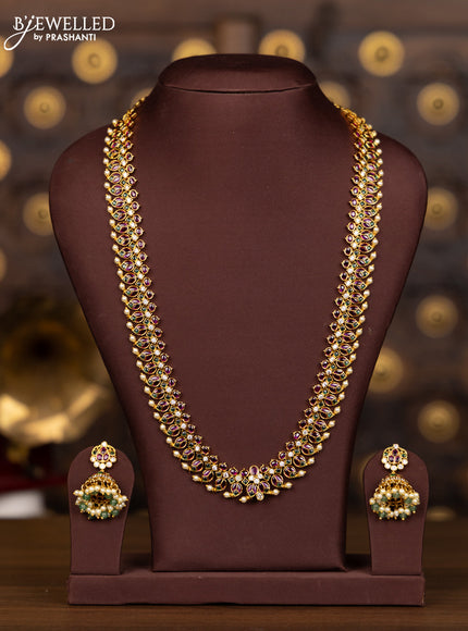 Antique haaram with leaf deisgn in multicolor kemp stones and pearl hanging